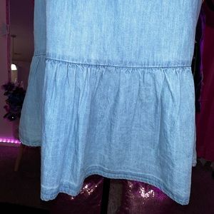 Ligh blue denim shirt/dress depending on how or who wears it